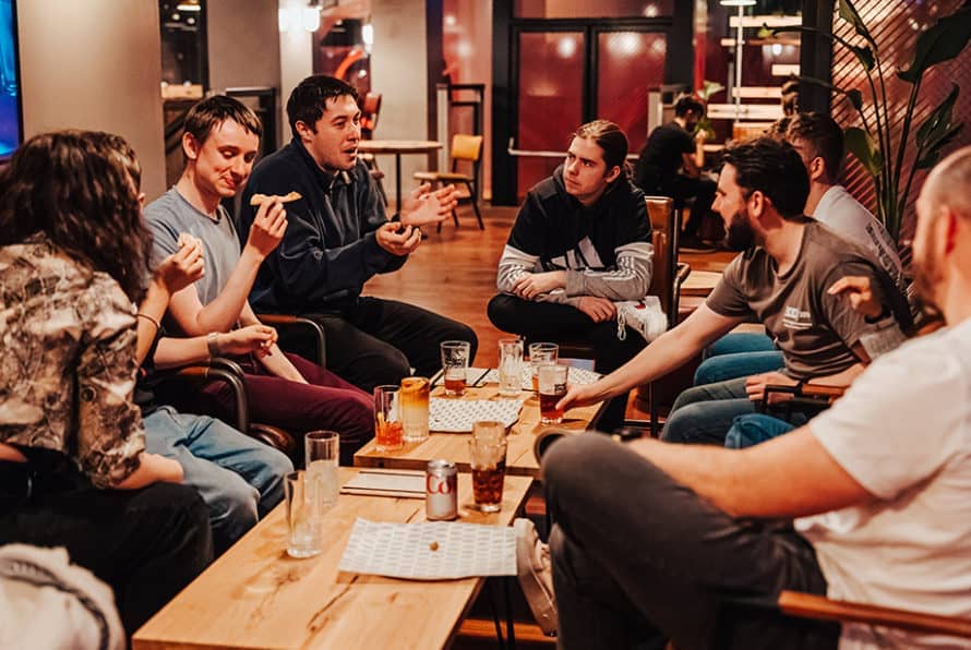 a group eating and drinking at Whistle Punks in Leeds